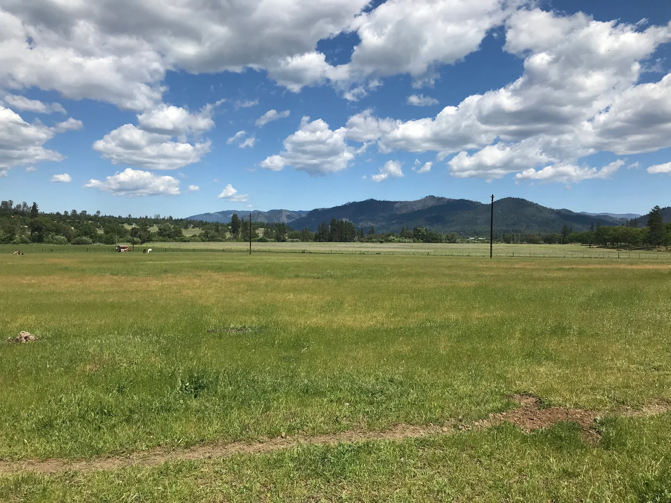 Heavenly Fields farm valley with mountains